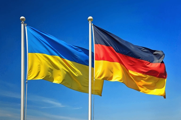 Ukrainische und deutsche Fahne